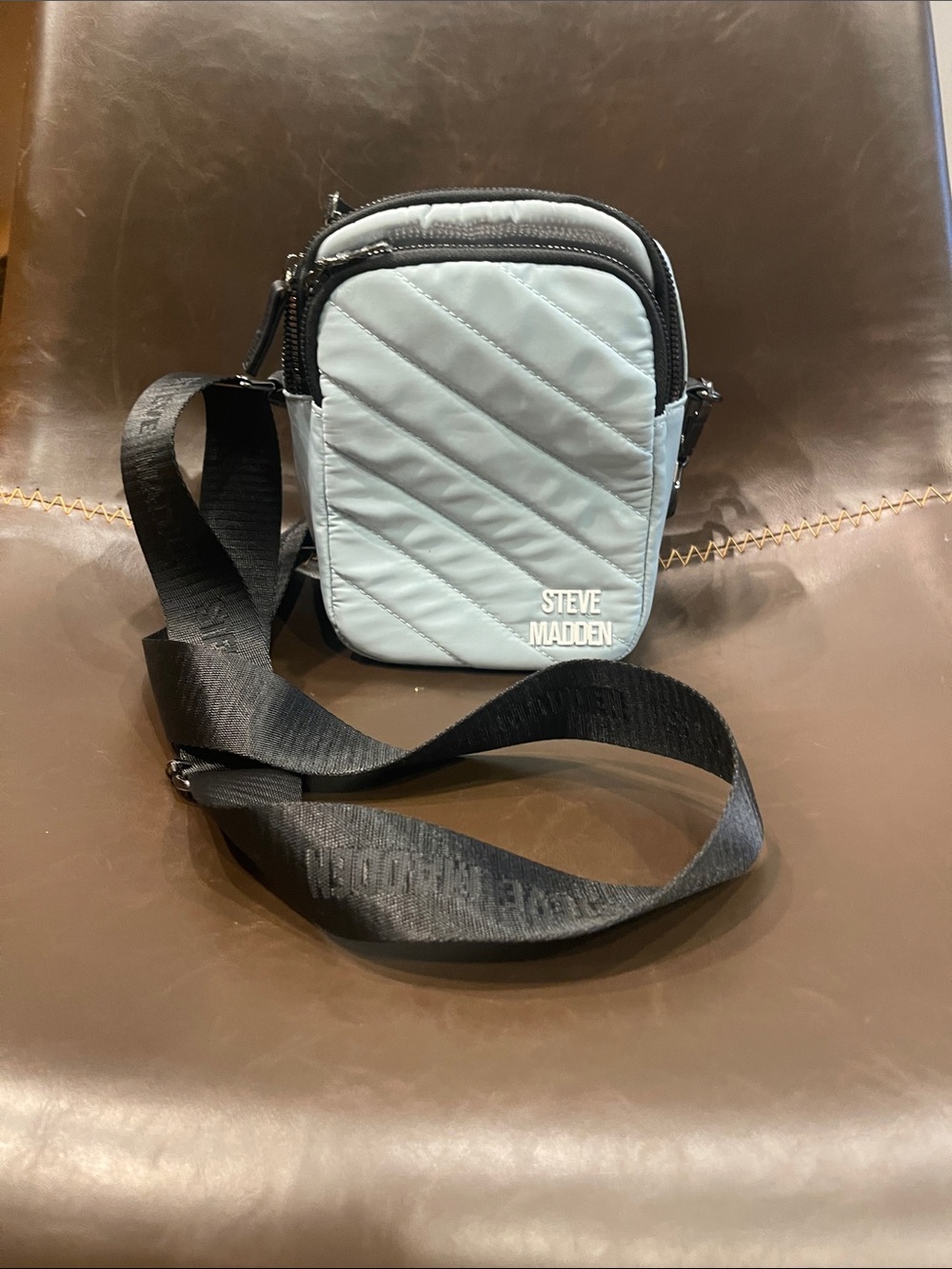 Steve Madden Light Blue Quilted Menโs Crossbody Belt Bag with Black Strap